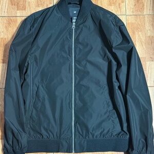 medium all-black bomber jacket from H&M